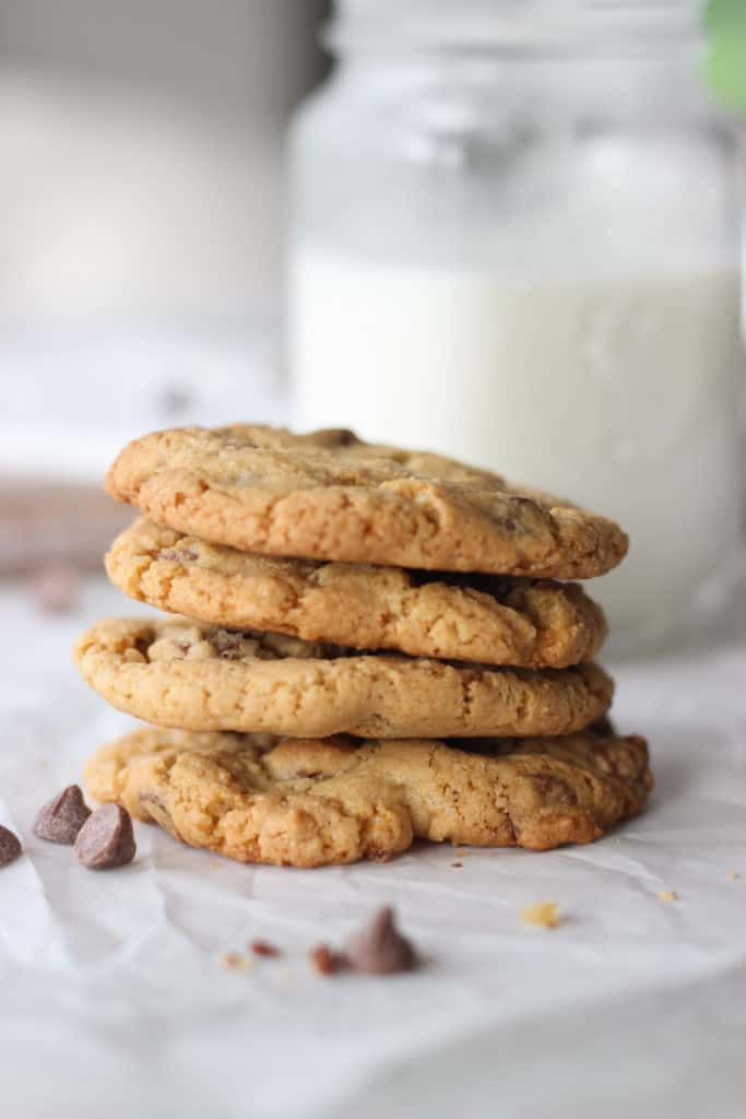 stack of four homemade chocolate chip cookies