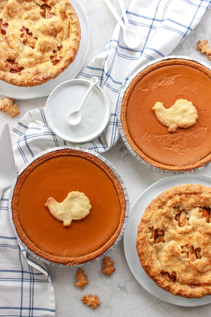 This batch of delicious pumpkin pie makes 2 huge pies and is perfect for Thanksgiving and even better for leftovers! #pumpkinpie #thanksgiving frostingandfettuccine.com