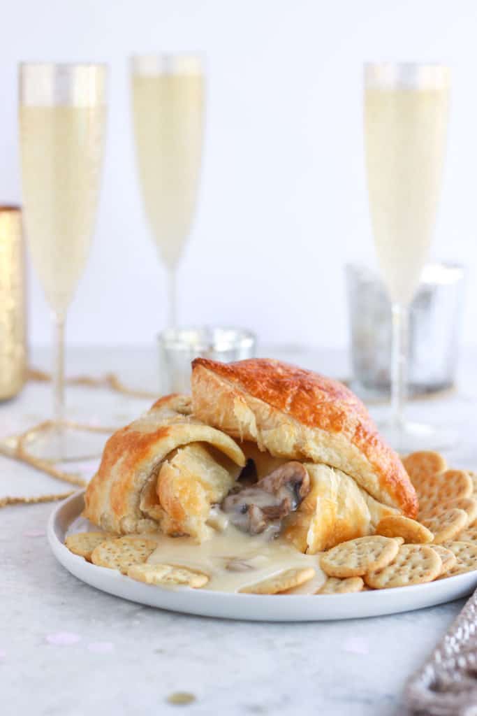Take your pick of either a sweet or savory baked brie- either way you can't go wrong! #appetizers #bakedbrie #party frostingandfettuccine.com