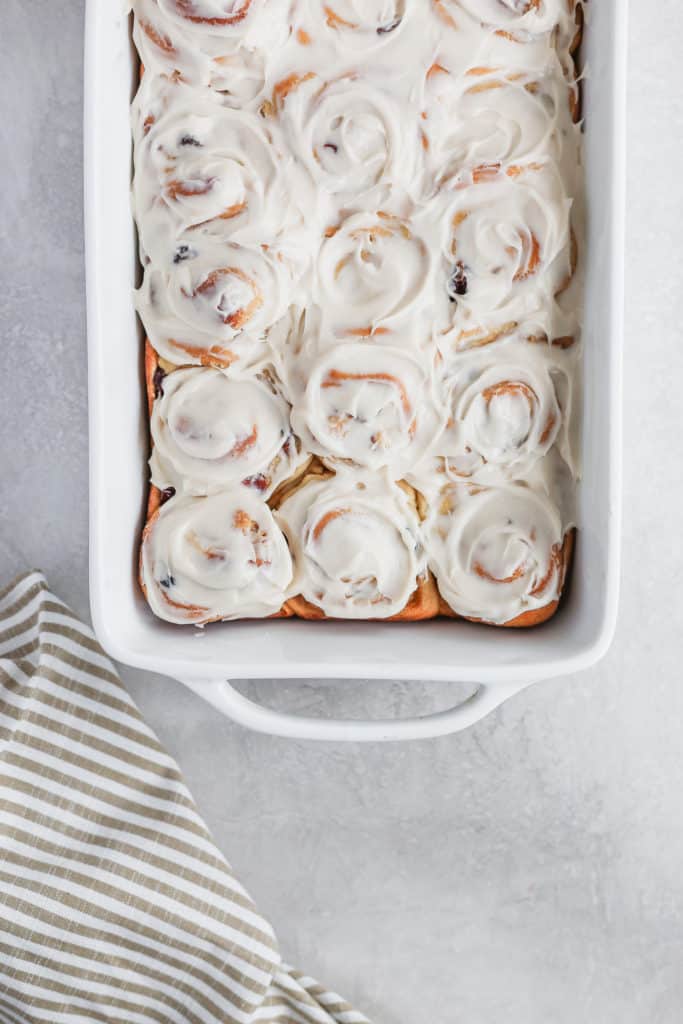 Bourbon Soaked Cherry Cinnamon Buns! Classic cinnamon buns with a nice southern twist. #cinnamonbuns #bourbon #bourbonsoakedcherries #buns frostingandfettuccine.com