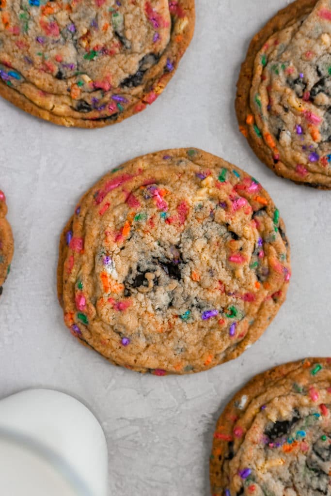A giant cookie with sprinkles and chocolate