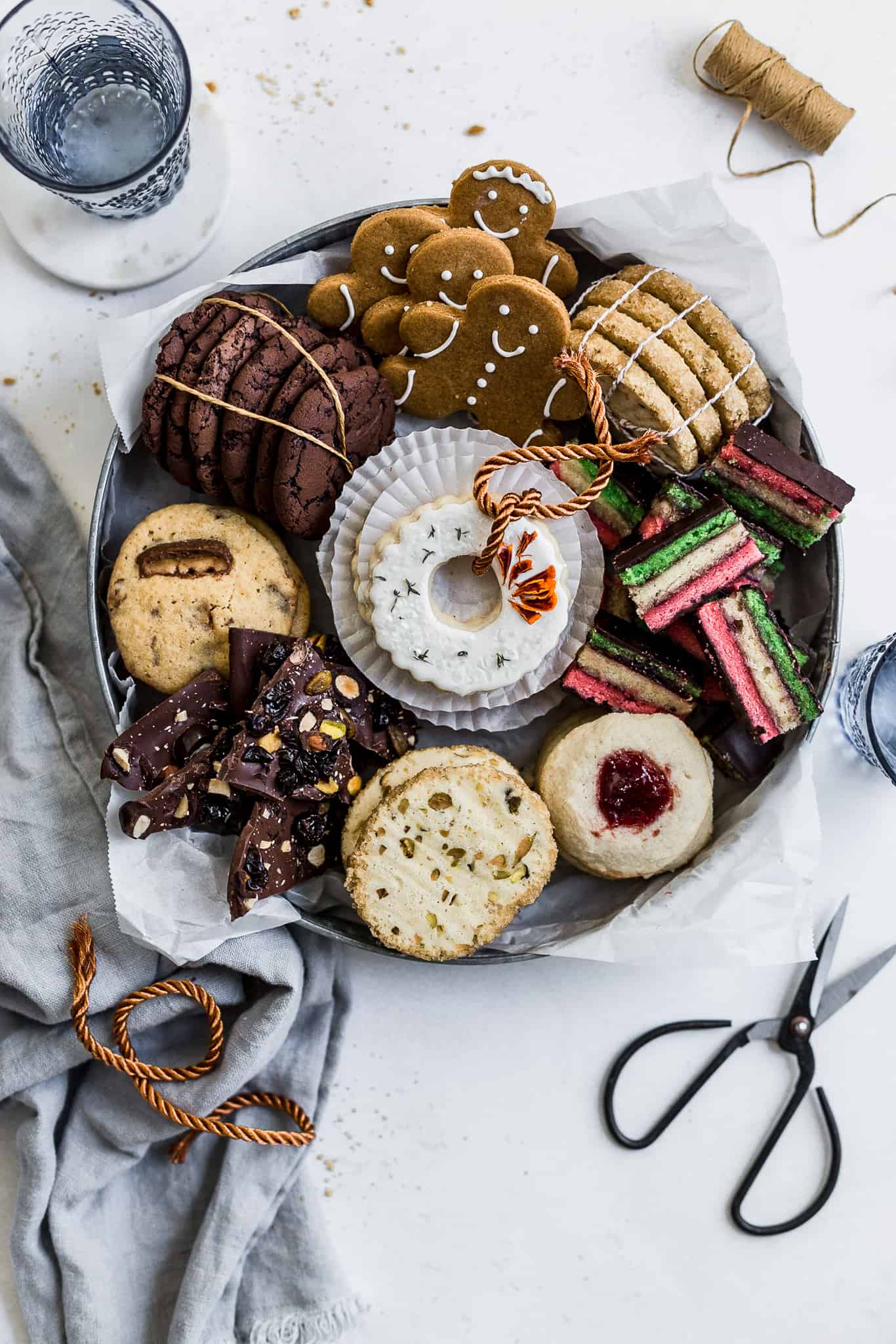 A tin filled with holiday cookies 