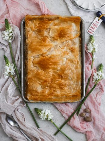 Peach slab pie made with filo dough on a sheet tray