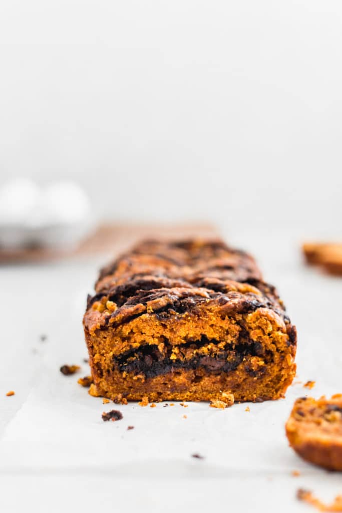 The inside of a moist pumpkin bread with chocolate.