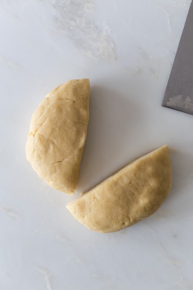 Pie crust cut in half to form two crusts