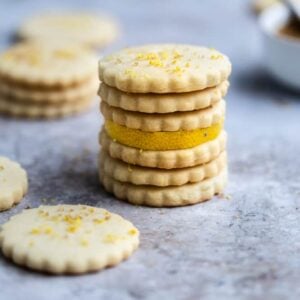 6 lemon shortbread cookies stacked on top of each other