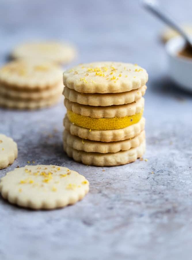 6 lemon shortbread cookies stacked on top of each other