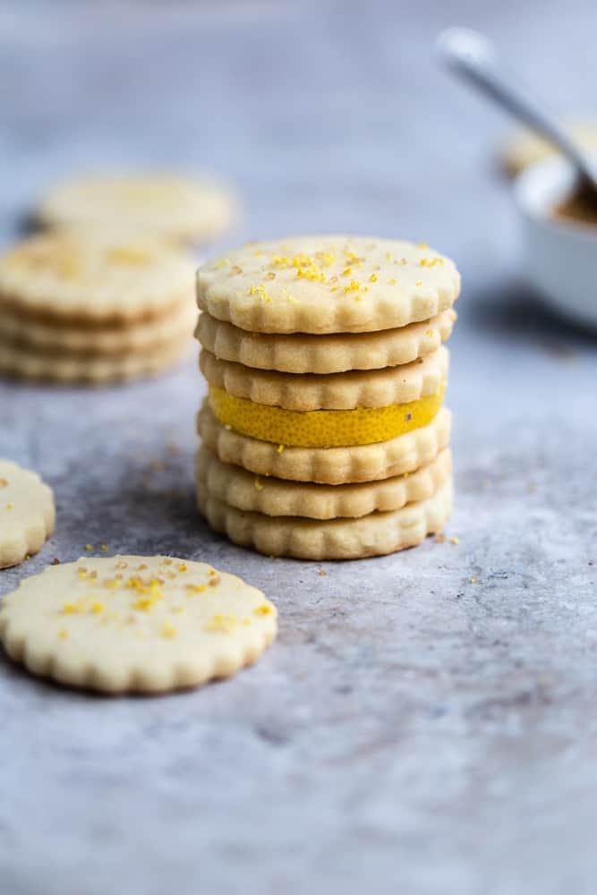 6 lemon shortbread cookies stacked on top of each other