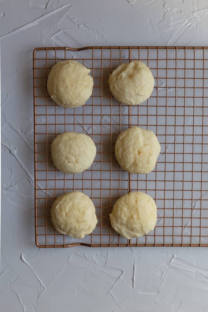 Baked italian ricotta cookies on a cooling rack