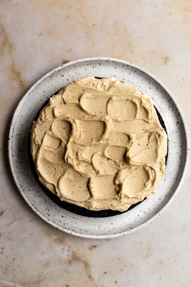 Coffee frosting frosted on a cake