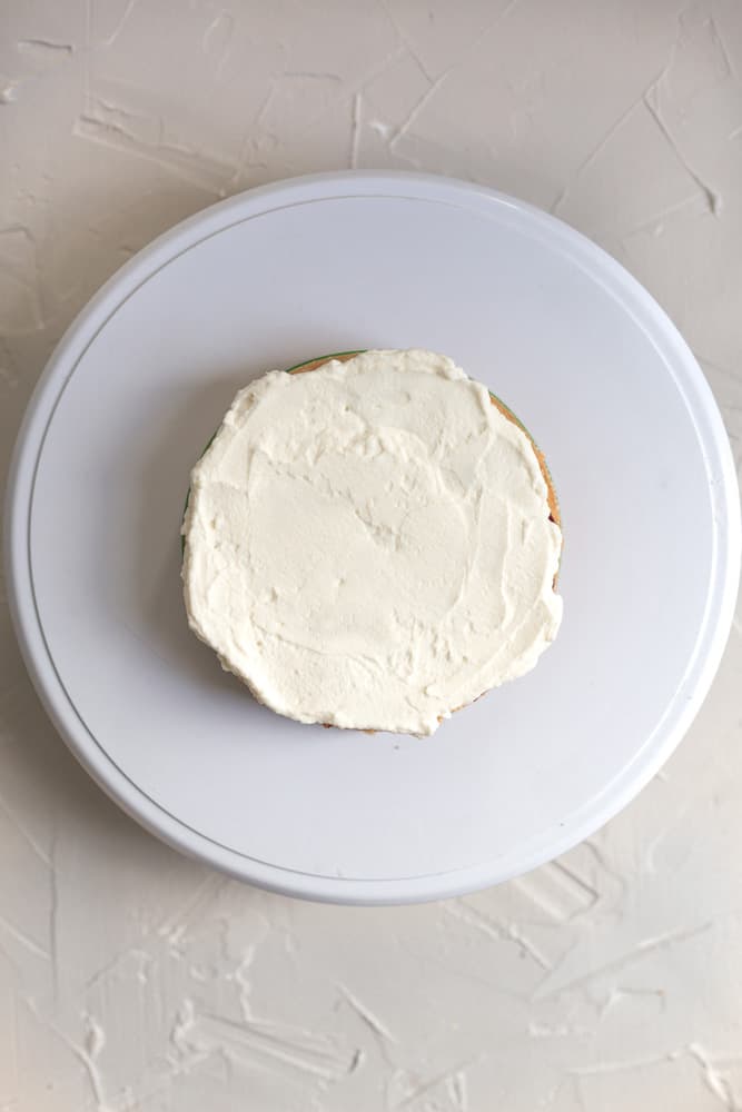 Mascarpone Chantilly cream on top of a cake layer