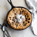 Skillet cookie topped with 3 scoops of ice cream