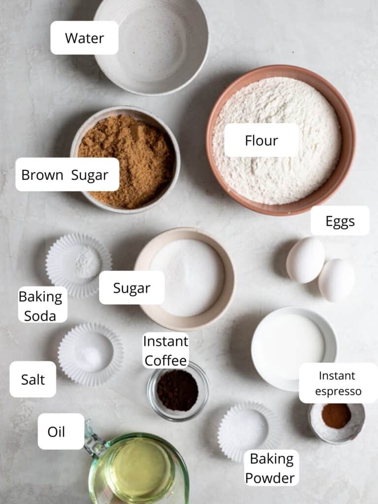 Ingredients for espresso cupcakes on a grey surface