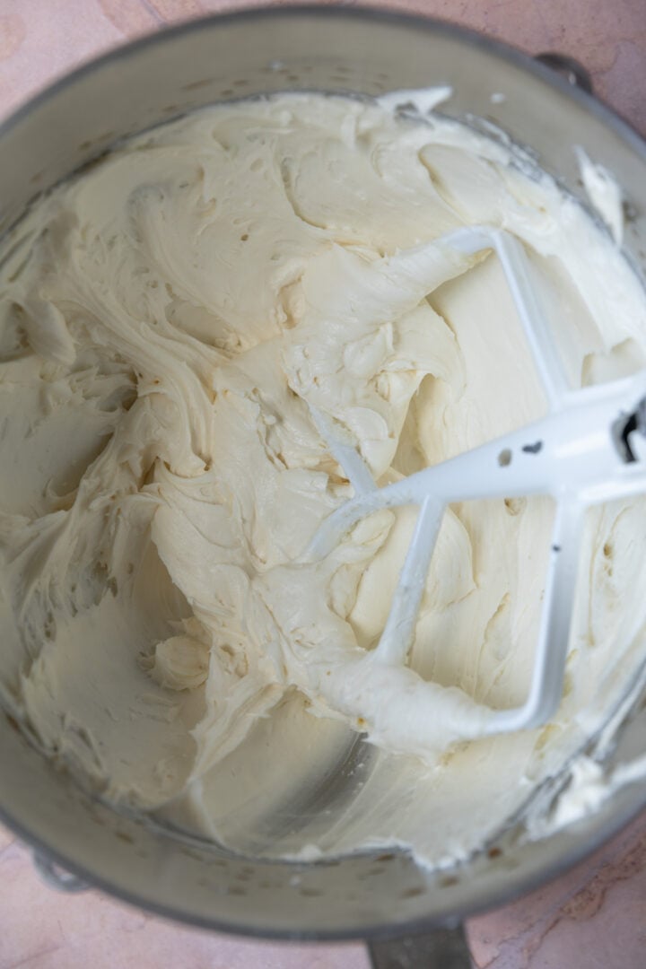 Cream cheese frosting in a mixing bowl.
