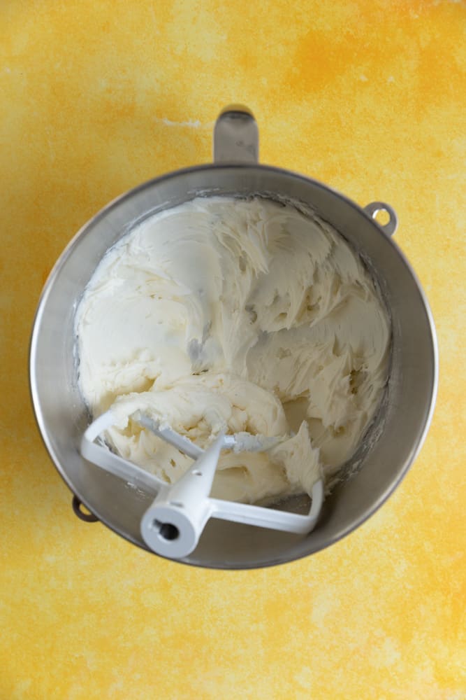 Lemon cupcake batter in a mixing bowl. 