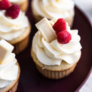 Raspberry cupcakes with white chocolate buttercream.