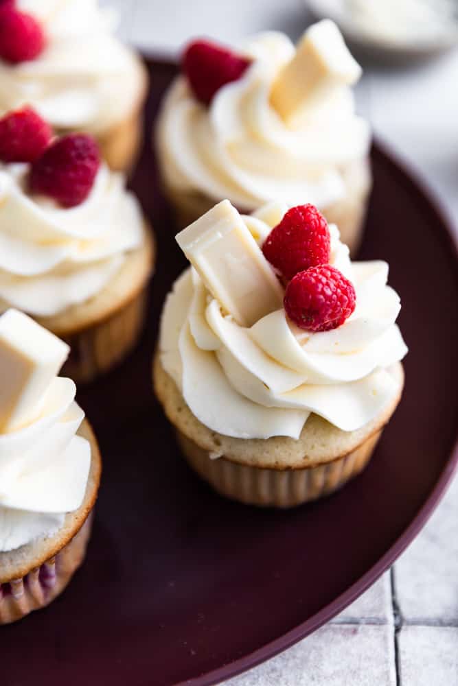 Raspberry cupcakes with white chocolate buttercream.