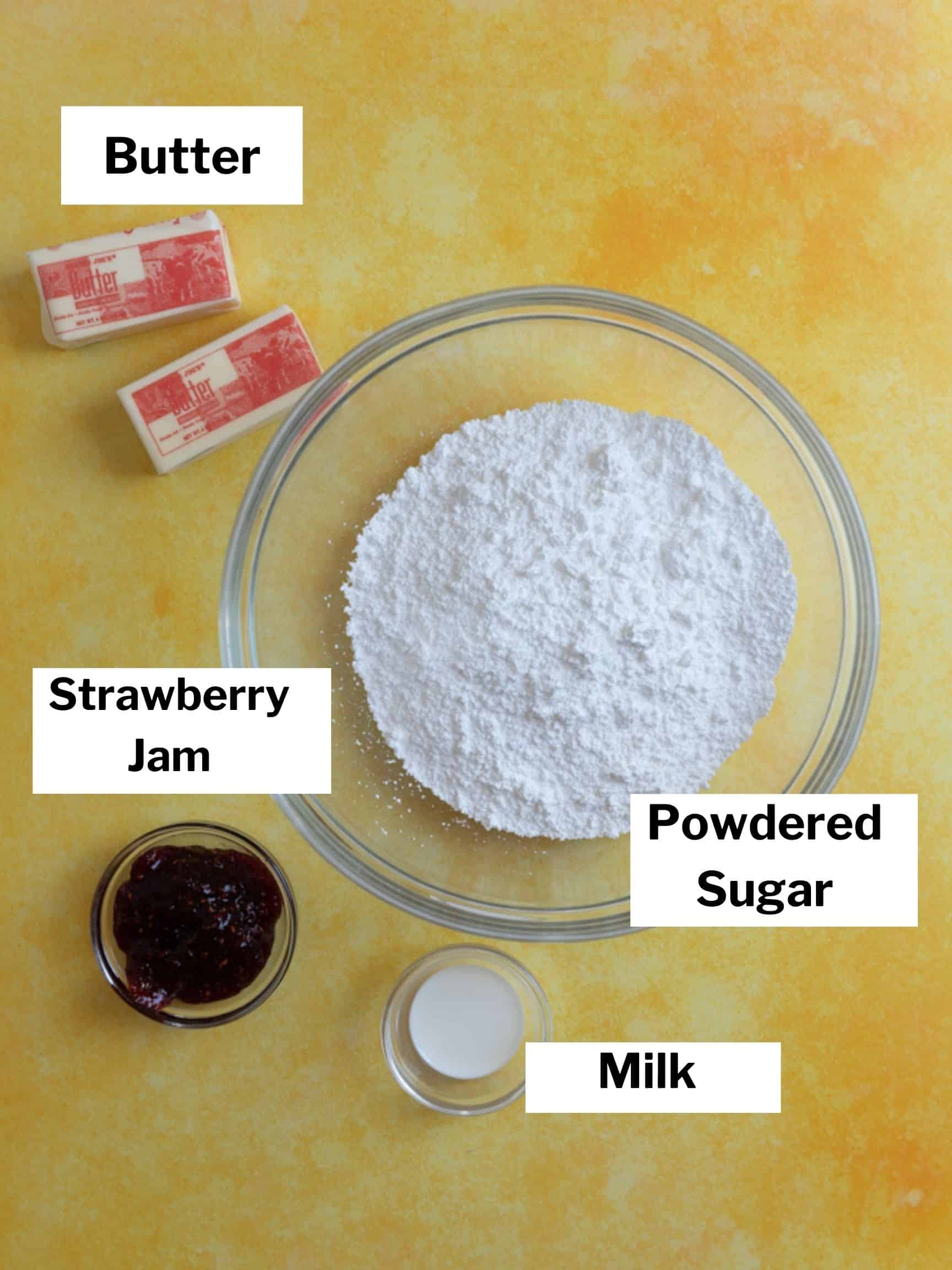 Ingredients for strawberry buttercream with jam.