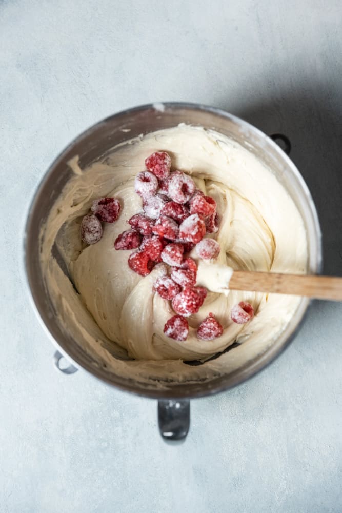 Flour coated raspberries in a cake batter.