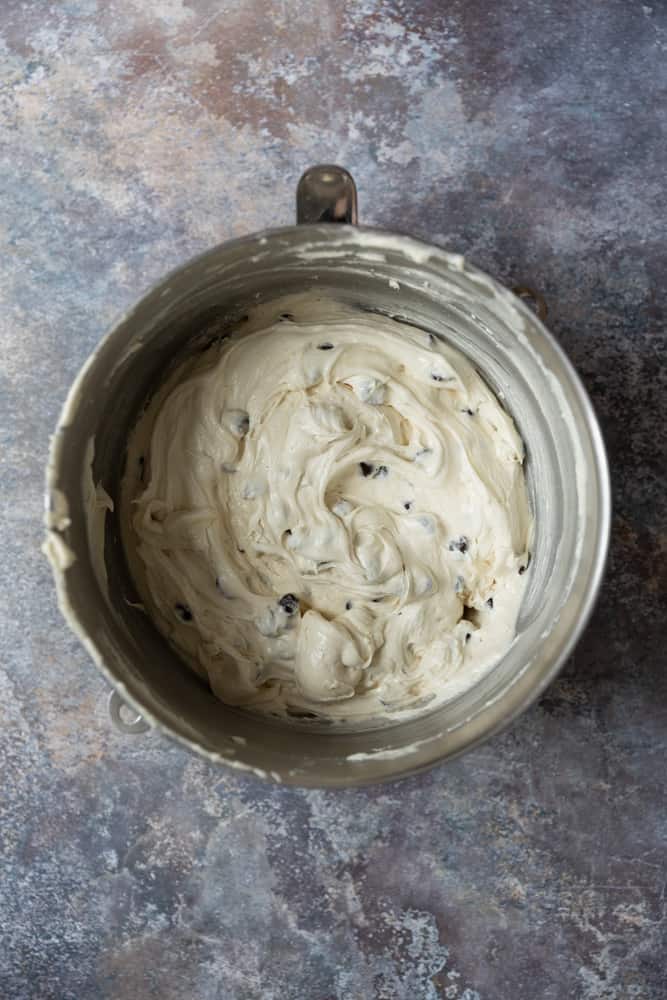 Chocolate chip bundt cake batter in a mixing bowl.