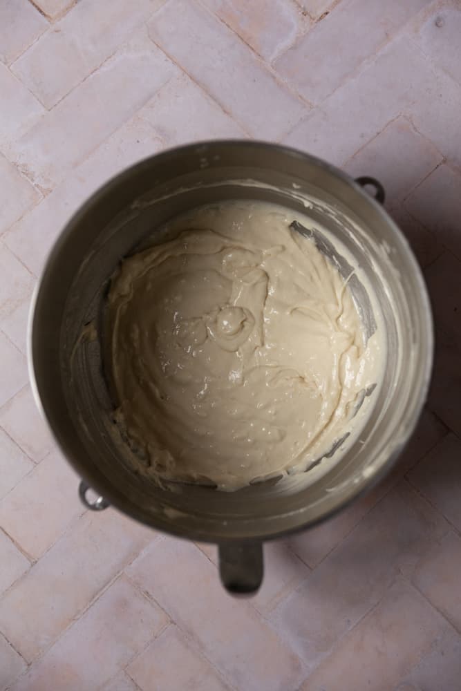 Coconut cupcake batter in a mixing bowl.