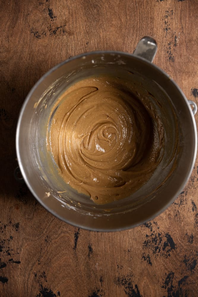 Gingerbread cupcake batter in a mixing bowl.