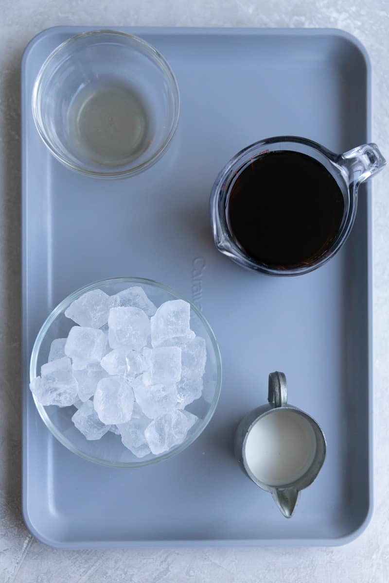 https://frostingandfettuccine.com/wp-content/uploads/2022/12/Vanilla-Iced-Coffee-1.jpg