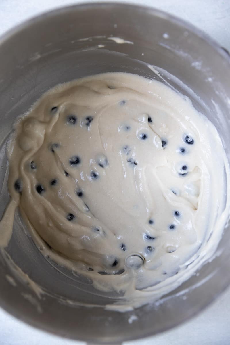 Blueberry cupcake batter in a mixing bowl.