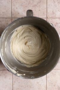 Vanilla cake batter in a mixing bowl.
