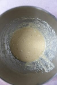 Wet ingredients for a cake mixed together in a mixing bowl.