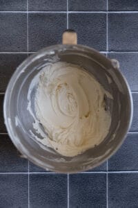 White frosting in a mixing bowl.