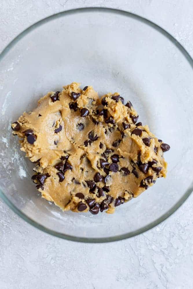 Mini chocolate chip cookie dough mixed in a bowl.