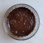 Fudgy brownie batter in a glass bowl.