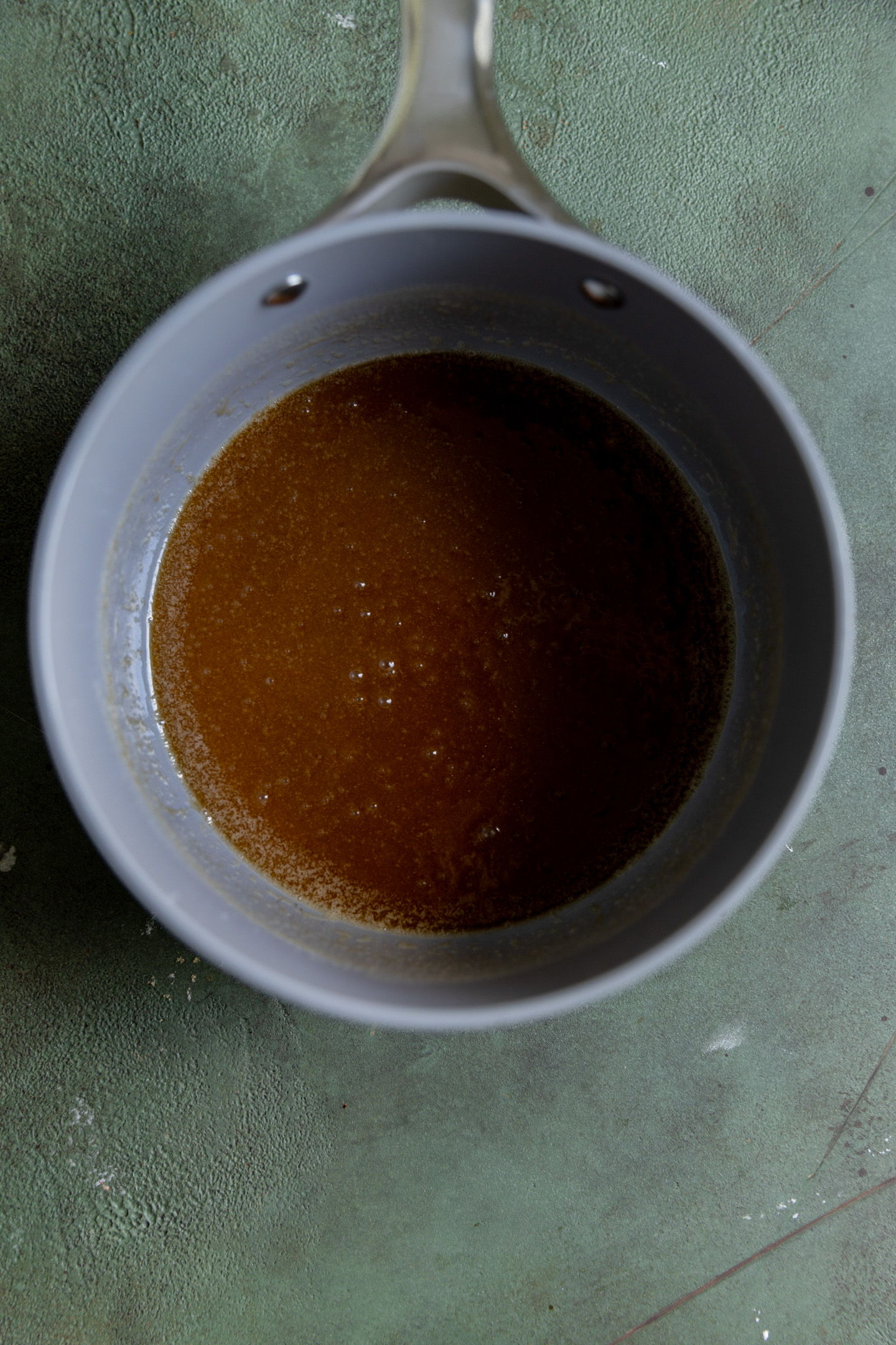 Caramel icing in a saucepan.