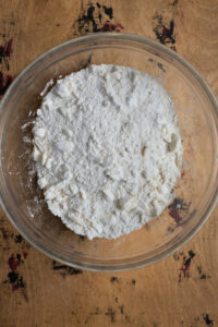 Dry ingredients for biscuit batter in a bowl.
