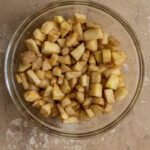 Diced spiced apples in a bowl.