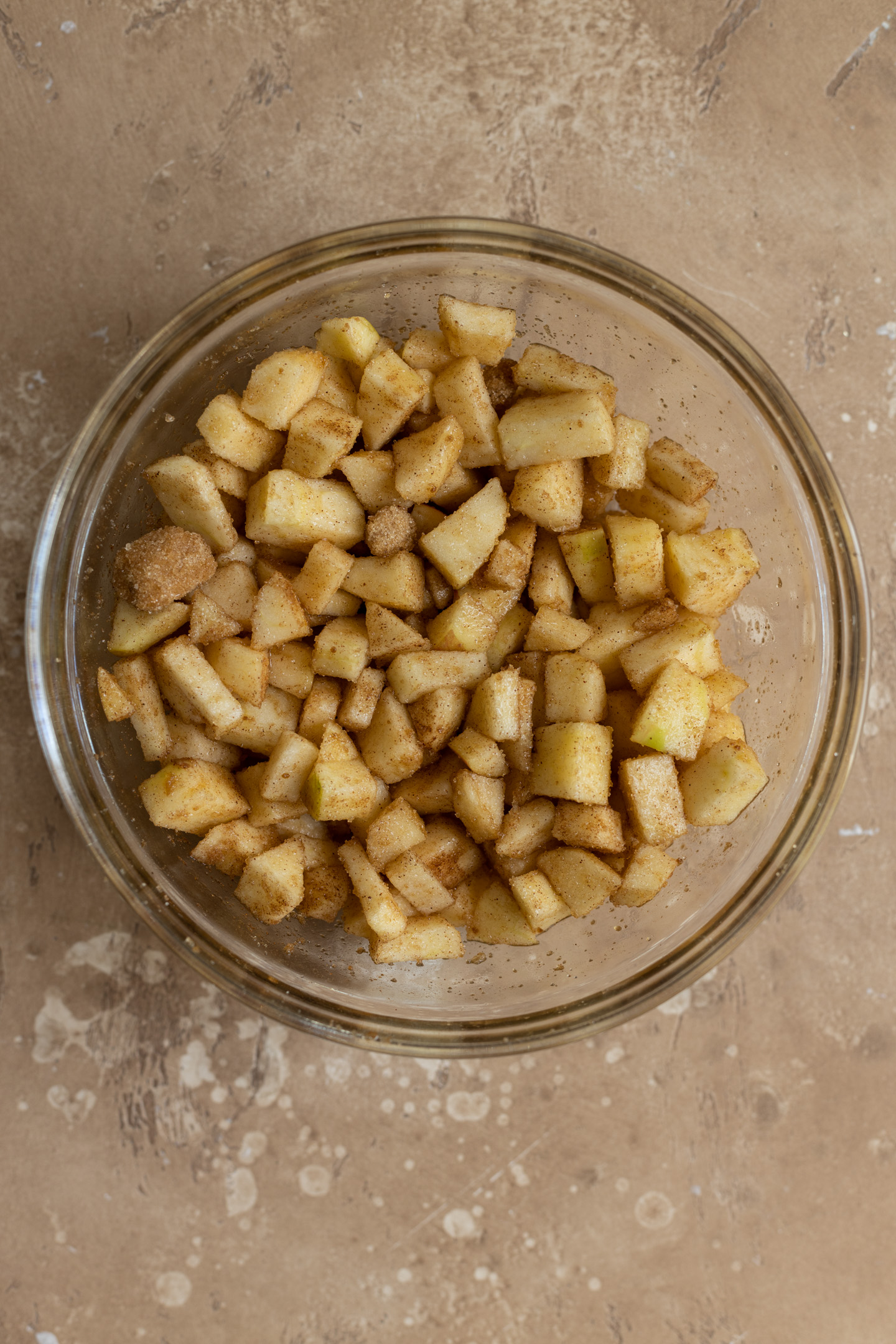 Diced spiced apples in a bowl.
