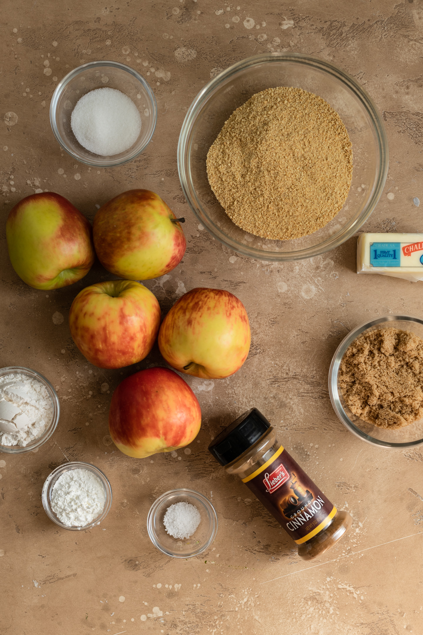 Ingredients for apple pie with a graham cracker crust.