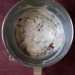 White chocolate raspberry bundt cake batter in a bowl.