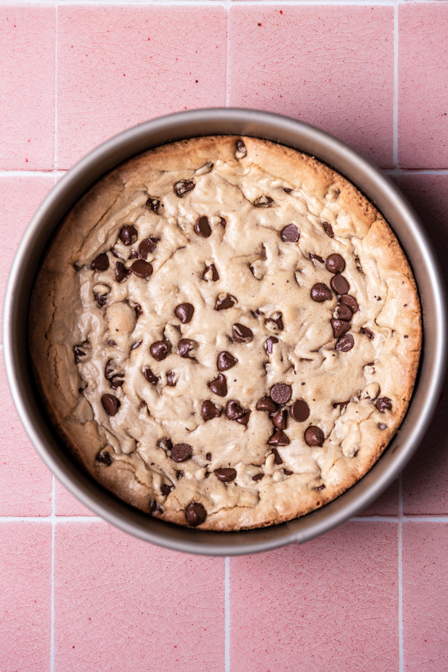Cookie batter baked in a springform pan.
