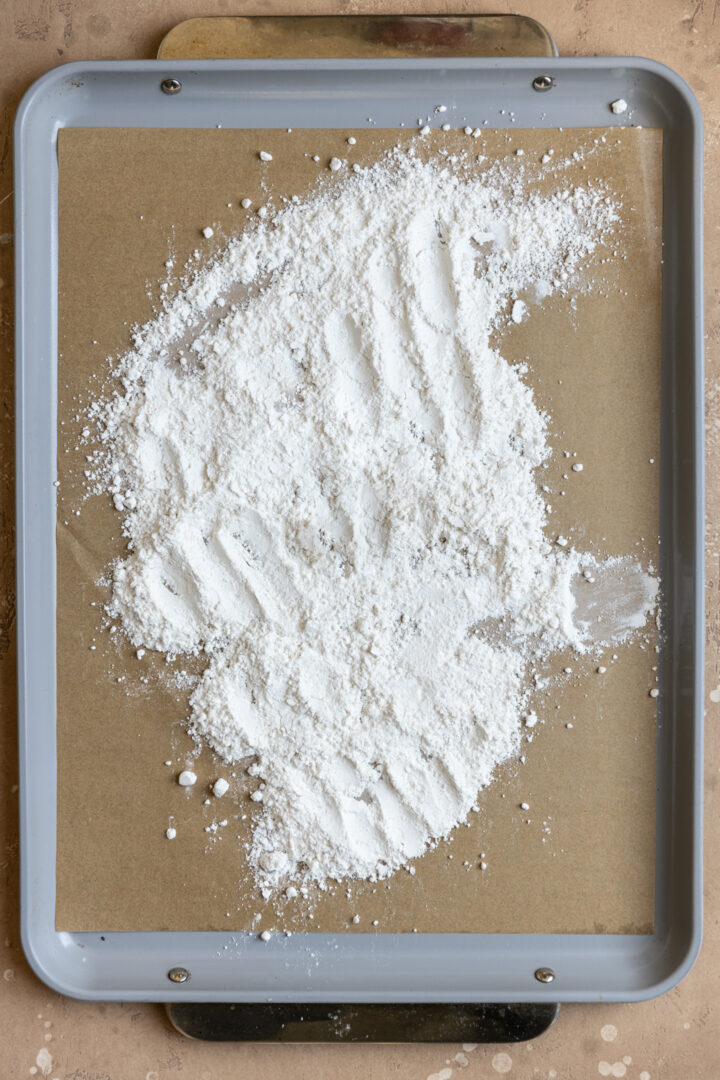 flour spread on a parchment lined baking tray.