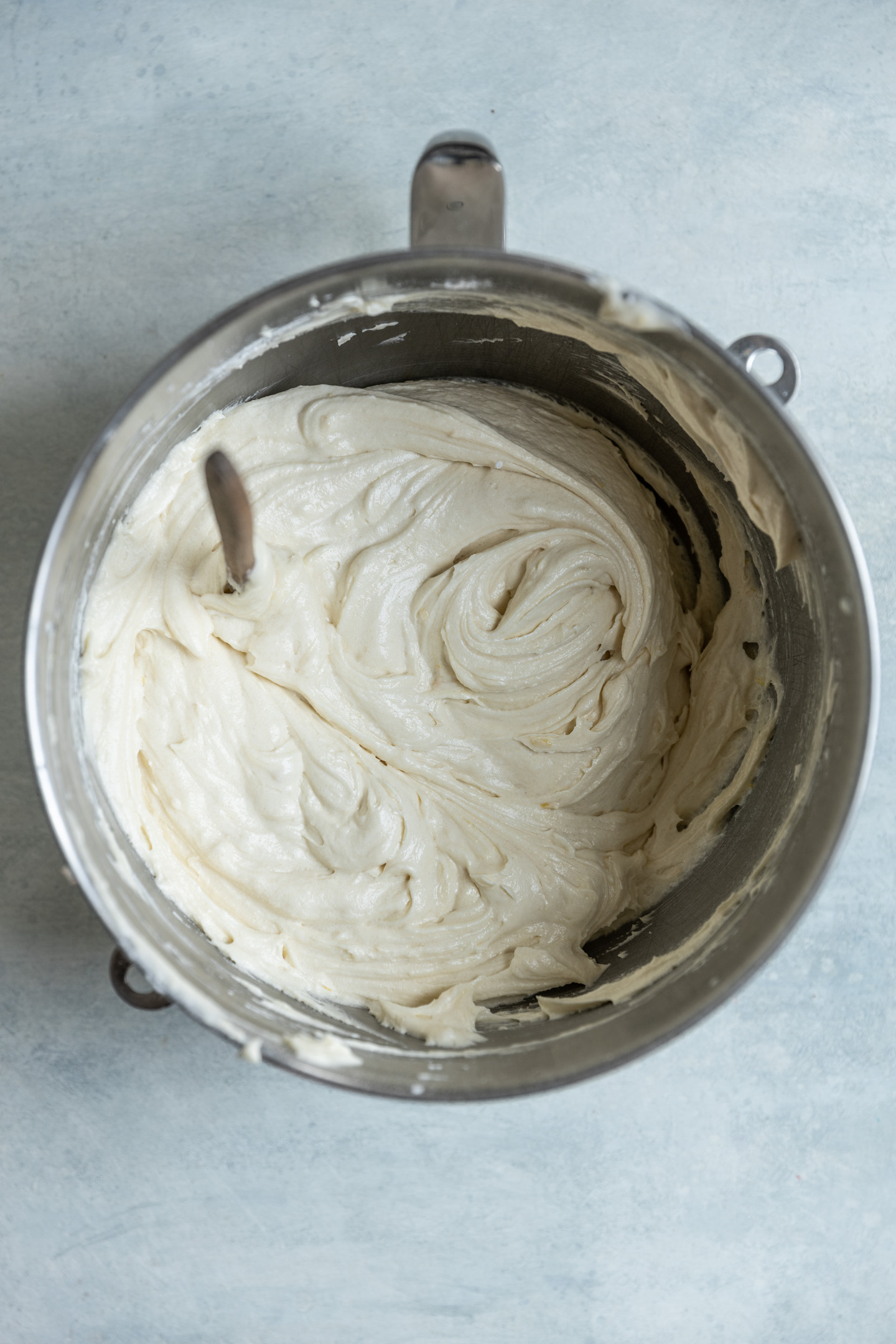 A thick white batter in a mixing bowl.