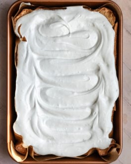 7 minute frosting spread over a vanilla sheet cake.
