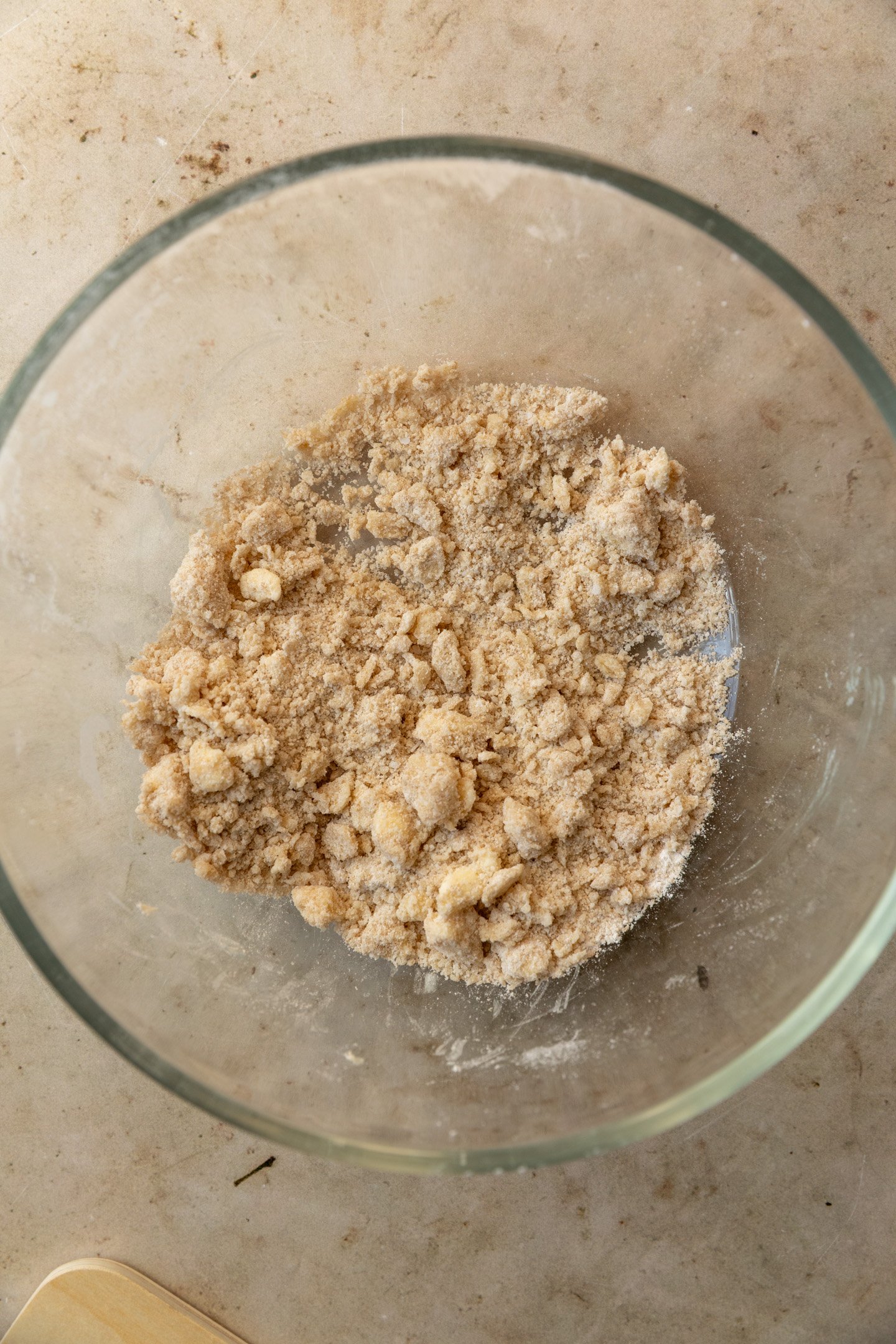 Pre baked streusel in a glass bowl.