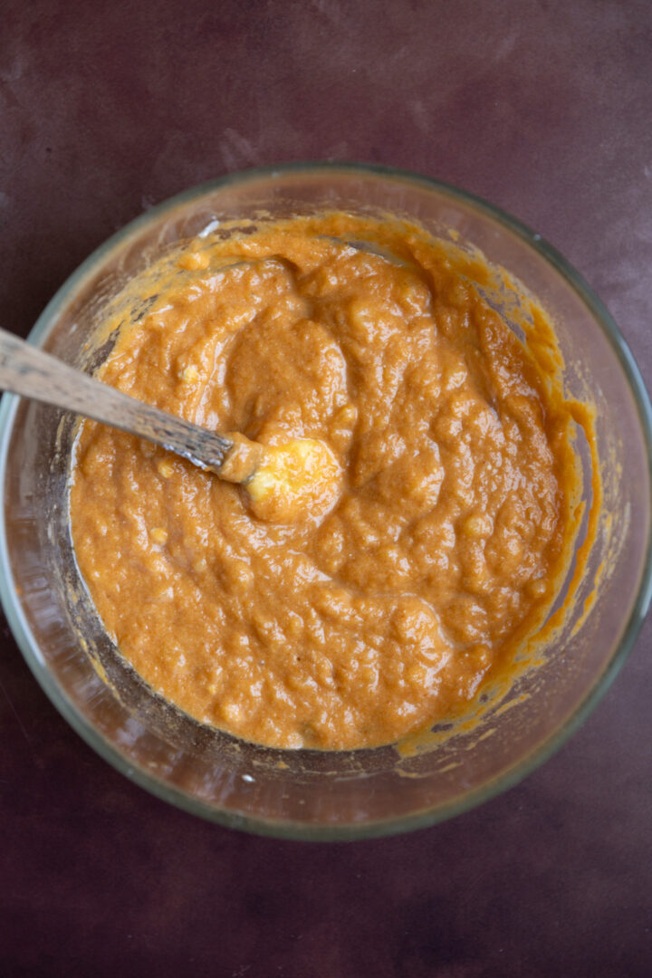 Liquid ingredients for pumpkin banana muffins.