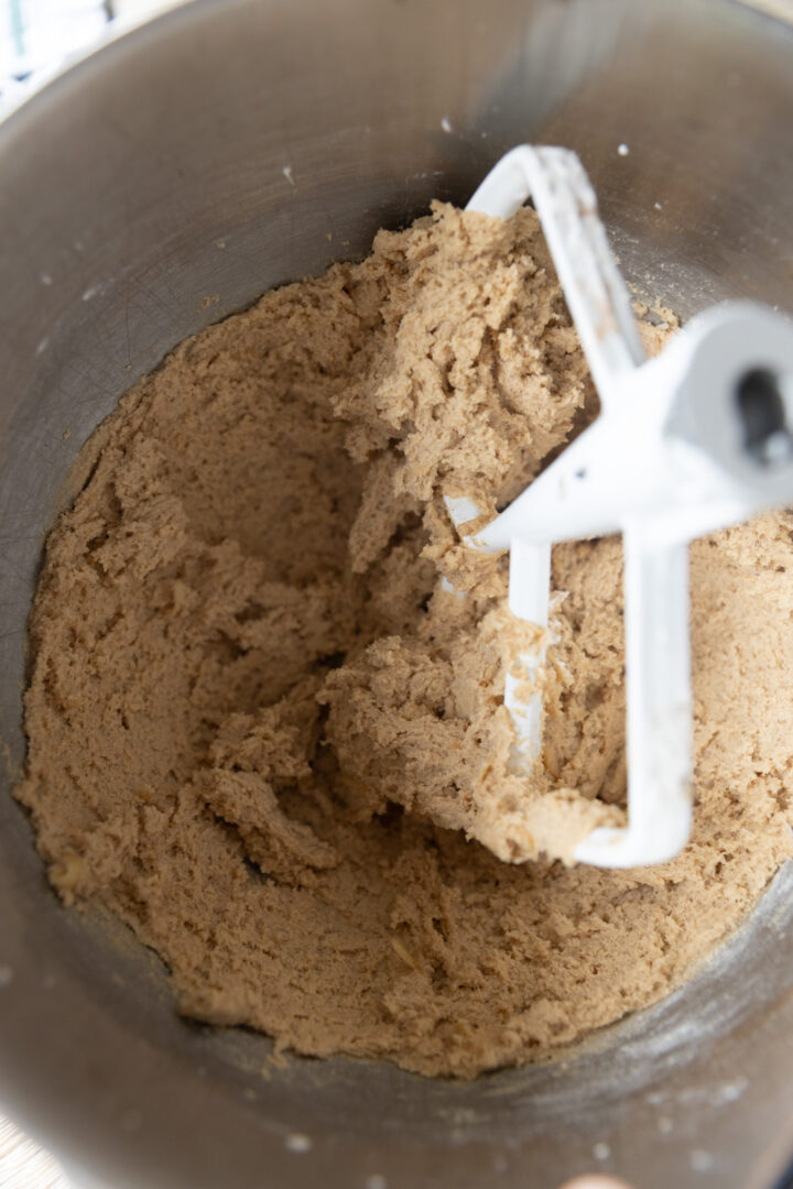 Batter for apple cookies in a mixing bowl.