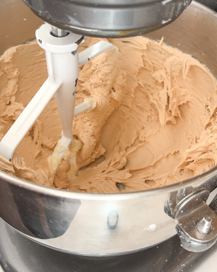 Cookie butter frosting in a mixing bowl. 