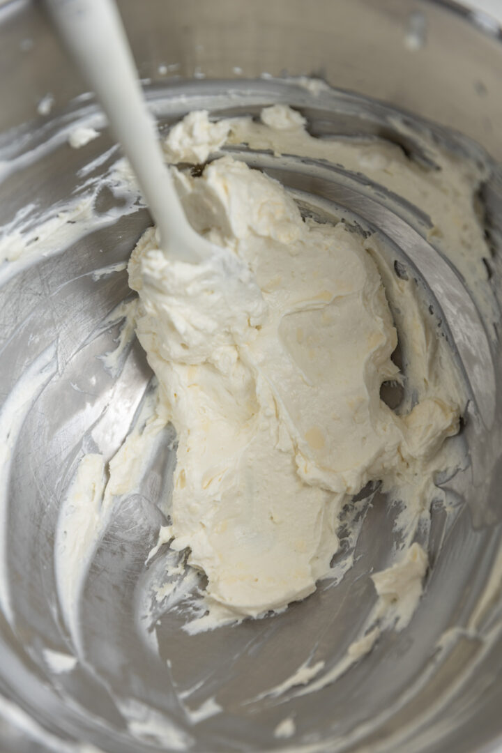 Cream cheese and butter whipped in mixing bowl. 