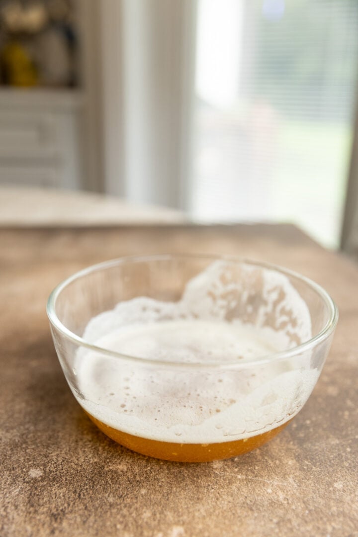 Brown butter in a glass bowl.