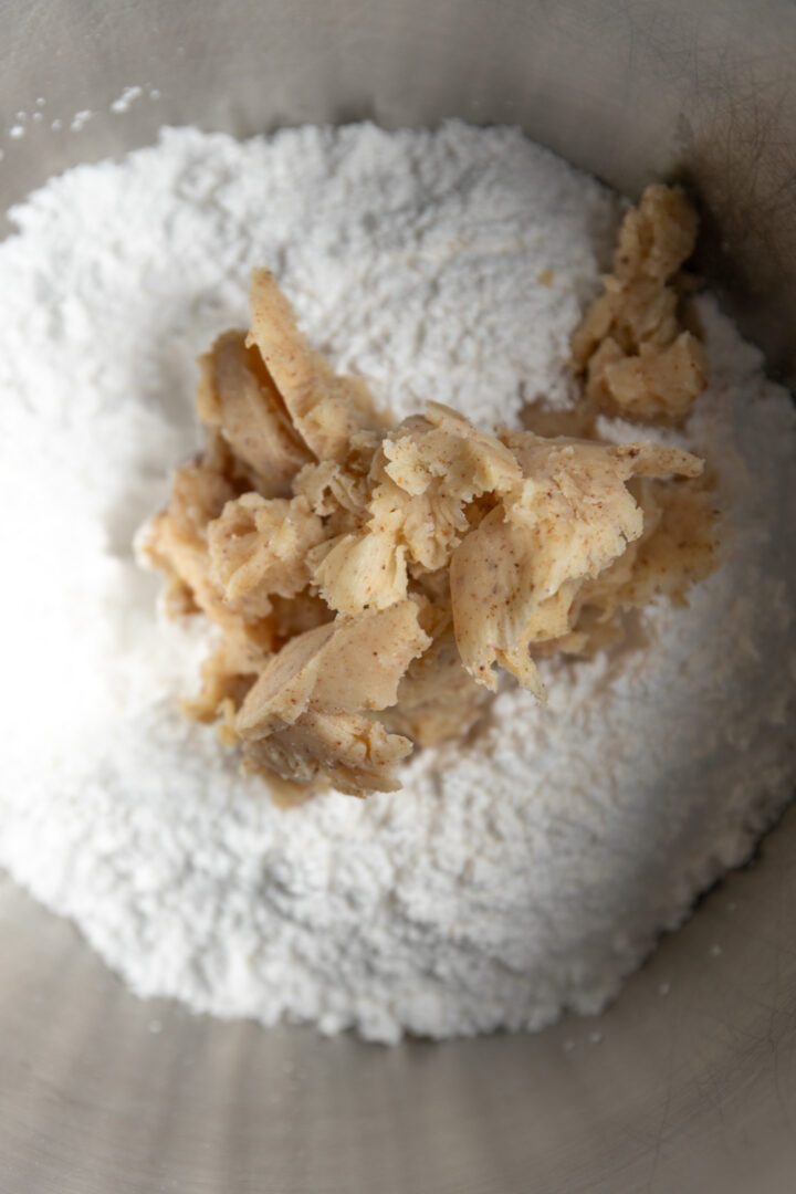 Browned butter added to powdered sugar.